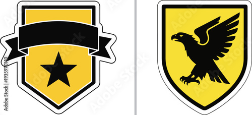 Two yellow military shield stickers: one featuring a black star and ribbon banner for custom text, and another showcasing a bold black eagle silhouette in a defensive posture.