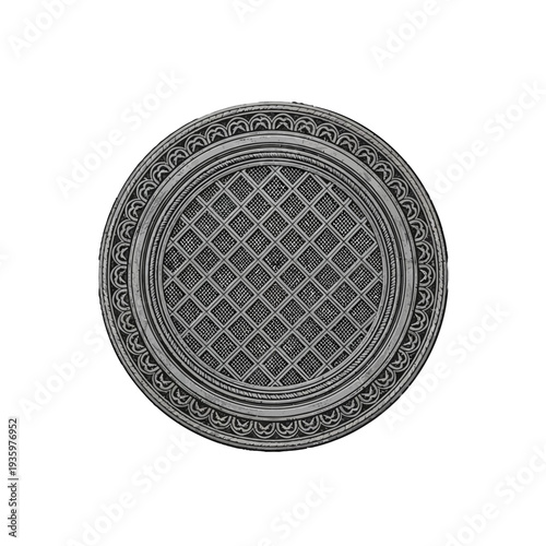 Decorative metal manhole cover with intricate lattice pattern and ornate border.