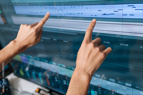 Canvas Print Sound engineer hands interacting with digital audio workstation software, creati
