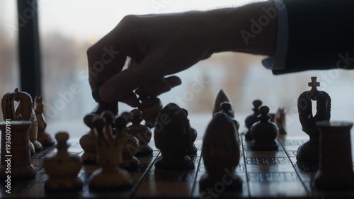 Middle Aged and Senior Businessmen Playing Chess for Money and Showing Wealth in Office