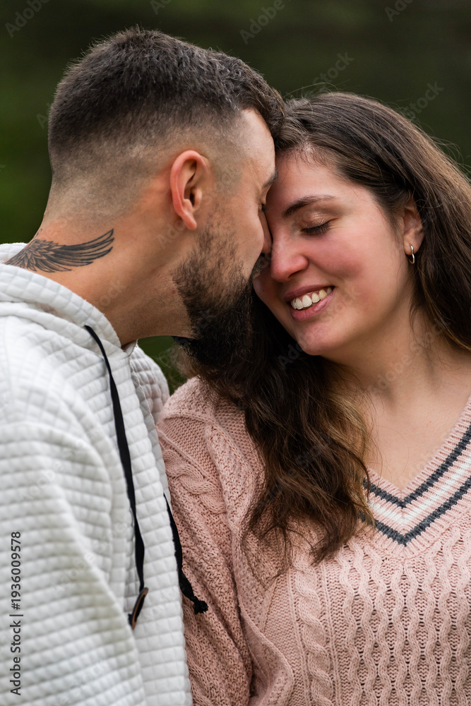 Obraz premium Young couple sharing intimate moment showing love and affection