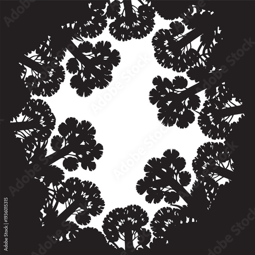 Silhouette of trees forming a circular frame against a bright white background in a low angle view