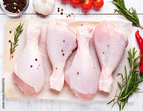 Raw chicken legs ready for cooking, top view. AI