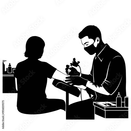 Tattoo Artist Working on Clients Arm.