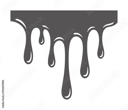 Dark gray liquid dripping from a flat surface drops