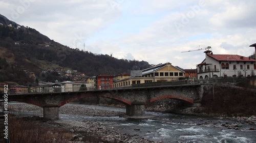 Ancient stone bridge over the Brembo river in San Pellegrino Terme, Italy
