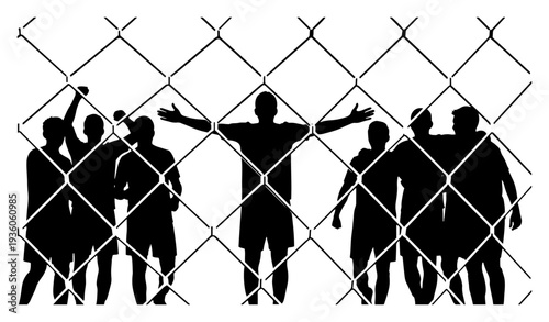 Group of soccer players silhouettes cheering together behind a wire mesh fence