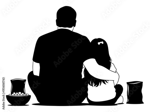 Silhouette of father and daughter sitting together and watching sports on television with snacks