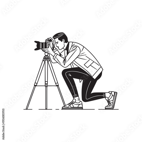 Professional Male Photographer Kneeling to Capture a Shot Using Camera and Tripod.