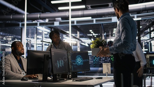 Vászonkép Furious data center engineer packs desk belongings after being replaced by AI automation handling operations