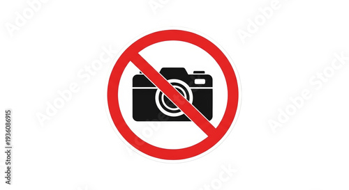 A clear prohibition sign displays a camera icon crossed out within a red circle, indicating that photography is not allowed in this area.
