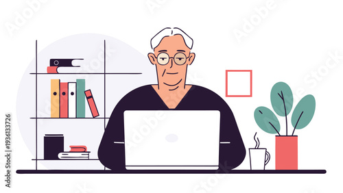 A senior man with grey hair and glasses in a dark sweater works on a white laptop at a desk with a steaming mug and a green plant.