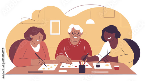 Three senior adults sit together at a wooden table painting on paper with brushes and art supplies in a warm indoor workshop environment.