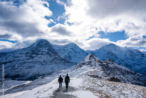 Tableau sur toile Männlichen Royal Walk snowy trail with majestic alpine mountain peaks
