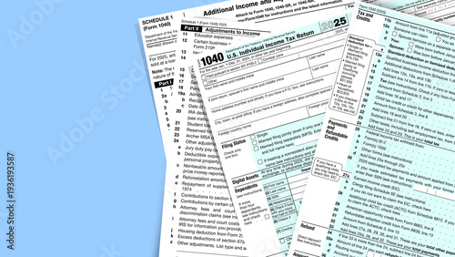 Foto Overhead view of US individual income tax form 1040 and Schedule 1
