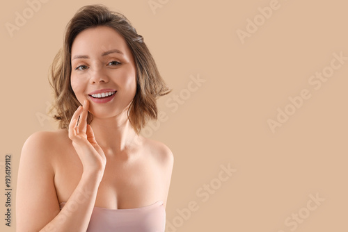 Beautiful young woman with ...