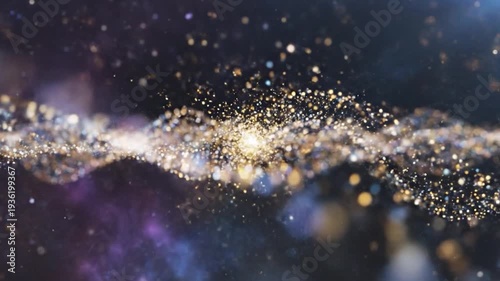 Golden and blue sparkling particles form an abstract wave pattern against