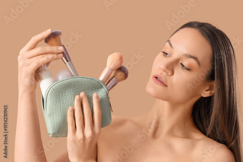 Beautiful young woman with ...