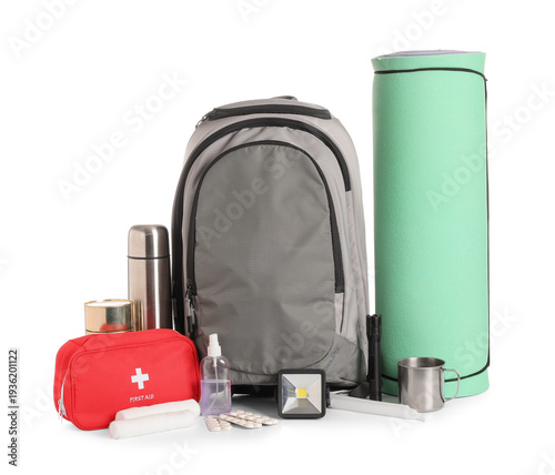 Obraz na płótnie Emergency backpack with necessities on white background