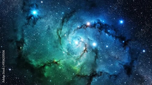 A breathtaking cosmic nebula glows with vibrant blue and green colors in deep