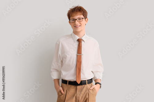 Young redhead businessman o...