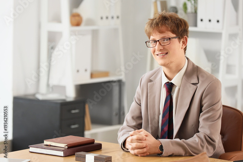 Young redhead businessman a...