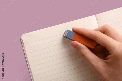 Woman erasing something in ...