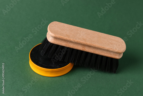 Shoe polish with brush on g...