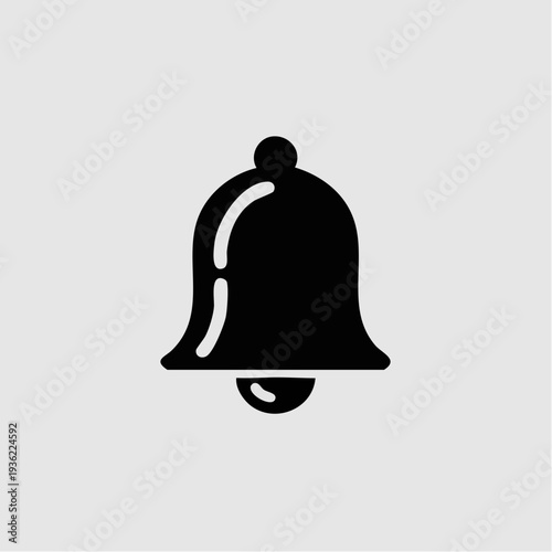 Simple black bell icon on a gray background.