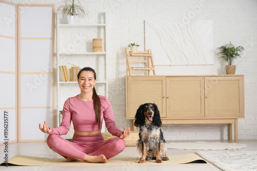 Sporty young woman with her...