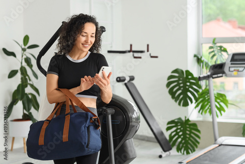 Mature woman with sports ba...