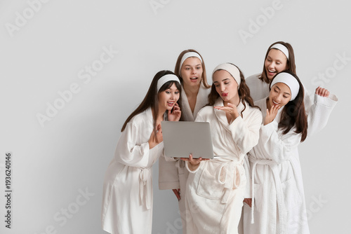 Group of young women in bat...