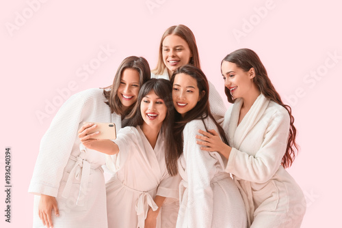 Group of young women in bat...