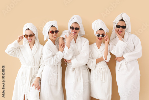 Group of young women in bat...