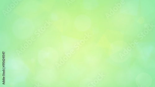 Soft green background with white bokeh lights