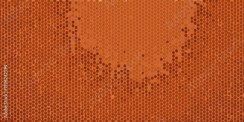 Orange honeycomb pattern with a blurred central shape
