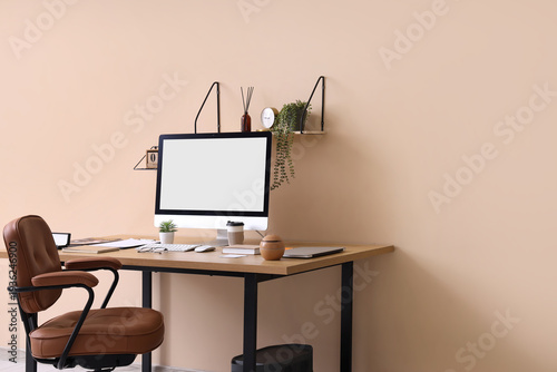 Workplace with blank comput...