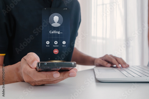 A man holding a mobile phone to call someone with a voice call. Outgoing call calling concept.