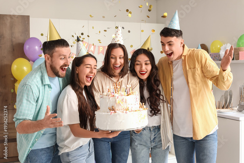 Group of young friends with...