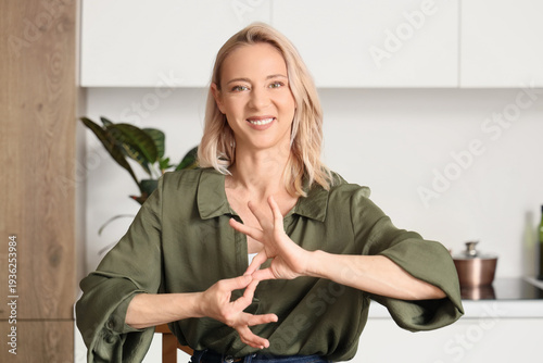 Mature mute woman using sig...