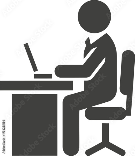 Corporate employee works diligently at office desk station
