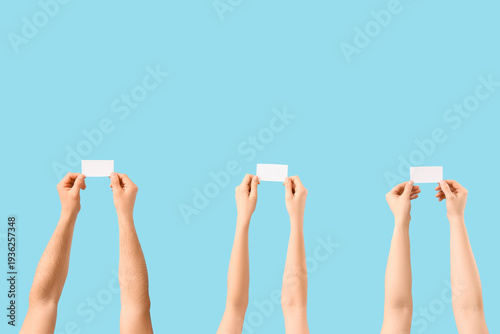 Many hands with blank paper...