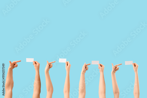 Many hands pointing at blan...