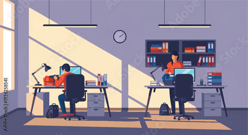 Modern office interior with two people working at desks and sunlight streaming through the window