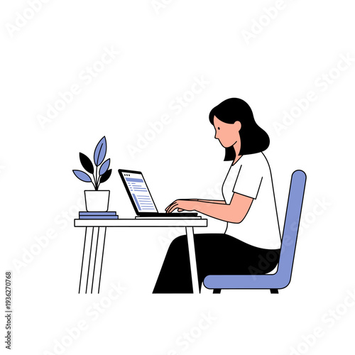 woman working on laptop at desk.