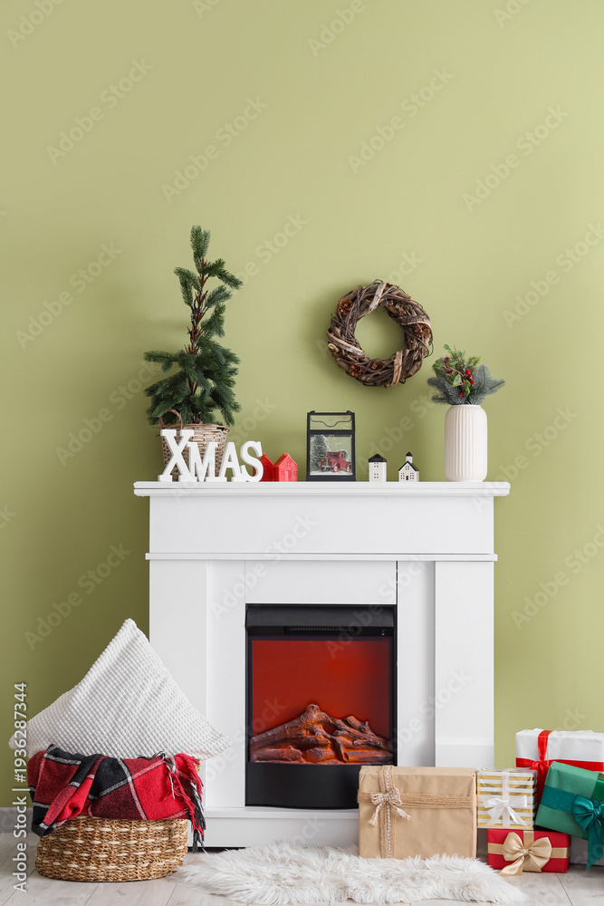 Fototapeta premium Interior of living room with fireplace, Christmas decor and presents