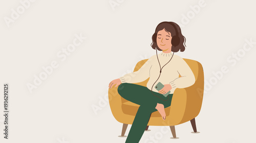 Woman relaxing on a yellow armchair listening to music on headphones with a smartphone in her hand