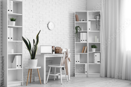 Workplace with chair, house...