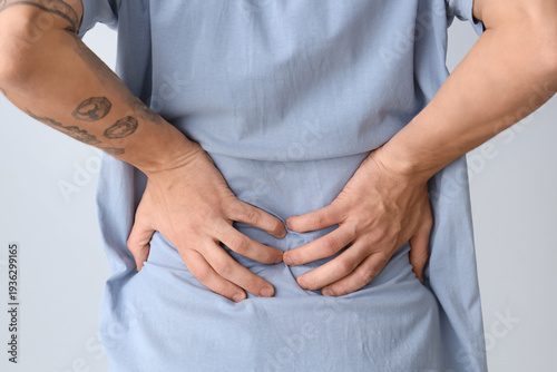 Young man suffering from ba...