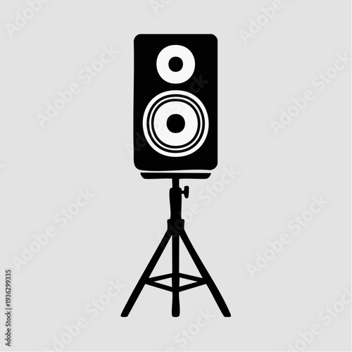 Black speaker on a tripod stand, simple graphic illustration.